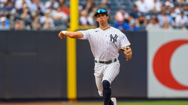 New York Yankees infielder Oswaldo Cabrera makes throw on infield